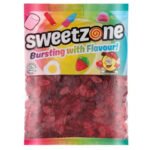 A vibrant mix of Sweetzone Juicy Berries gummies in strawberry and blackcurrant flavors.